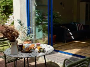 Maisons de vacances la Maison sous les Arbres - Duplex, jardin et spa : photos des chambres