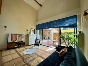 Maisons de vacances la Maison sous les Arbres - Duplex, jardin et spa : photos des chambres