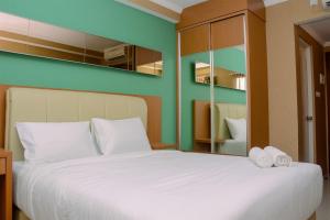 Cozy and Modern Signature Park Grande Studio Apartment By Travelio
