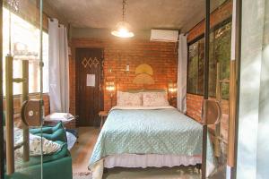 Suíte com Vista para o Rio e Cachoeira no Quintal