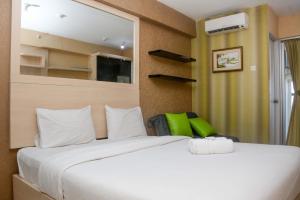 Comfort and Spacious Studio Room Bassura City Apartment By Travelio