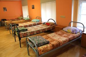 Bed in 6-Bed Dormitory Room with Shared Bathroom room in Gostyny Dvor na Polyanke