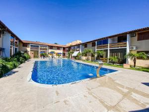 Flat com 1 quarto com ar split, sala e cozinha completa, No condomínio Portal do Atlântico a 100m praia de Taperapuã (Barraca do Gaúcho) , portaria 24hrs, piscina.