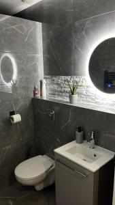 Appartements MagicSpa91 : photos des chambres
