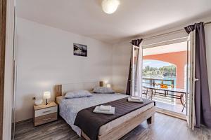 Two-Bedroom Apartment with Terrace and Sea View room in Apartments by the sea Prizba Korcula - 175