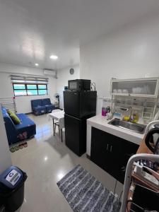 2BR Ground Level Entire Condo Central Aircon Sleeps 4