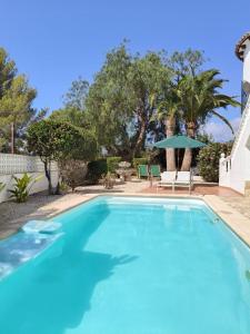 Appartment Paquero downstairs with your own private garden and your own private pool