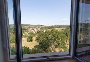 Maisons de vacances Cabana & Maison sur les hauteurs - Proche Cluny : photos des chambres