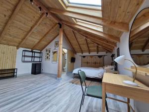 Studio in the attic with private bathroom