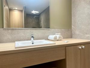 Appartements Au Coeur des Arenes - Parking - Wifi - Clim : photos des chambres