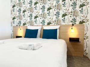Appartements Au Coeur des Arenes - Parking - Wifi - Clim : photos des chambres