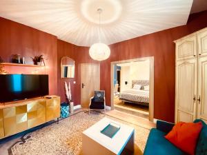 La suite 2 pièces lit queen size entrée privée