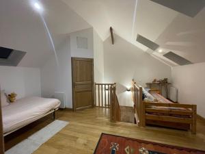 Maisons de vacances Maison chaleureuse- cheminee, nature et sport ! : photos des chambres