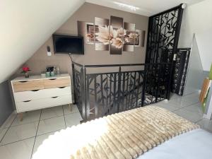 B&B / Chambres d'hotes L-Escale Arc-en-Ciel : photos des chambres