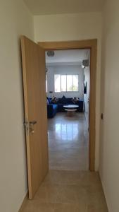 Appartement confortable avec vue sur la baie de Tanger et detroit de Gibraltar,situé en face de Mnar de Tanger ,Nouinouich, Residence avec piscine collective