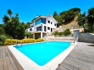 Villa con piscina vistas al mar en Arenys de Munt - Subiráns