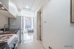 Inviting Studio in Damac Hills Carson B, Dubailand by Deluxe Holiday Homes