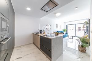 Amanecer Signature Penthouse - high-end rooftop terrace - by OYOOSTAYS