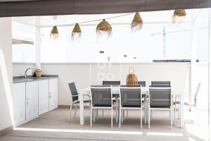 Amanecer Signature Penthouse - high-end rooftop terrace - by OYOOSTAYS