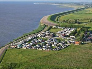 Nr 90 Neues, ruhiges Ferienhaus direkt am Wattenmeer, hundefreundlich, komplett eingezäunt