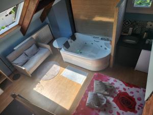 Appartements Bleu studio jaccuzi appart : photos des chambres