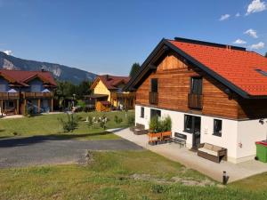 Huis 3landenpunt AT-SLO-IT bij de piste