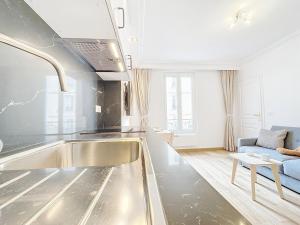 122 - Luxueux pied-à-terre parisien