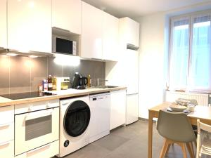 Appartements Appart-Village Le Creusot centre - Parking facile - Bus gare TGV 17 min : photos des chambres