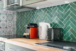 Appartements Le Grand Blanqui - Face RER B - Free Parking : photos des chambres