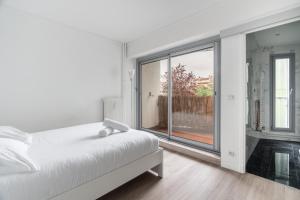 Appartements Le Grand Blanqui - Face RER B - Free Parking : photos des chambres