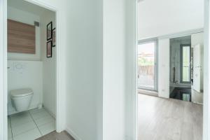 Appartements Le Grand Blanqui - Face RER B - Free Parking : photos des chambres