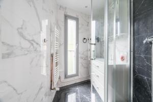 Appartements Le Grand Blanqui - Face RER B - Free Parking : photos des chambres