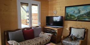 Maisons de vacances le familial avec spa, sauna salle de jeux : photos des chambres