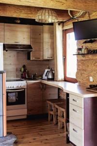 Cozy cabin by the lake in ecological farm Kemešys