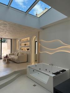 Villas Capsule cine glisse - cinema - spa balneo - garage : photos des chambres