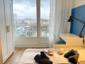 Appartements Le FRIENDLY, proche PARIS : photos des chambres