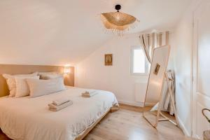 Appartements Charmante Maisonnette : photos des chambres