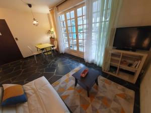 Appartements T2bis 4-6p spacieux, local velo prive, veranda : photos des chambres