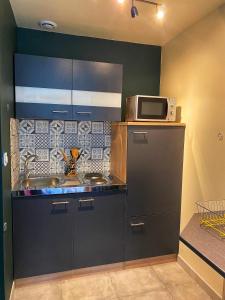 Appartements La Butinerie : photos des chambres