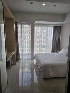 Green Sedayu Apartment Suite by Ellison