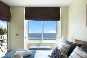 Depto Frente al Mar con Piscinas, Quincho, Jacuzzi y Sauna