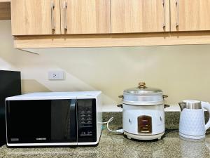 2BR Condo with Balcony and Parking