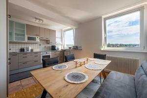 TAMLiving Zentrum Luxus Parken Messe WIFI Traumaussicht Sunrise&Sunset