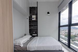 Designer Suites 2BR Apartment in Penang near George Town Self Check-In WiFi Partial Seaview