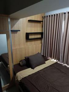 The jarrdin Apartemen by Apato