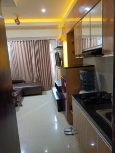 The jarrdin Apartemen by Apato