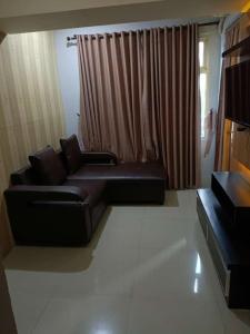 The jarrdin Apartemen by Apato