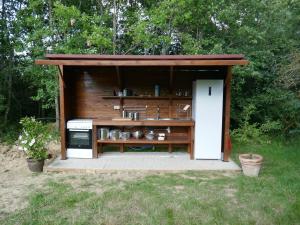 Campings La roulotte aux nuits insolites d-Argoumbat : photos des chambres