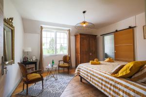 B&B / Chambres d'hotes Chalet des longschamps : photos des chambres
