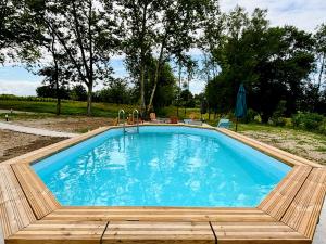 Maisons de vacances L'Eperonnette, cozy house with swimming pool, surrounded by vineyard, near St Emilion : photos des chambres